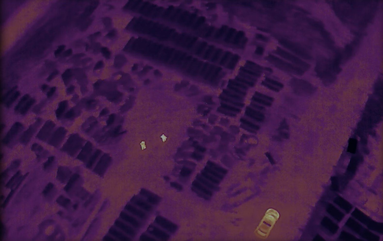 Thermal aerial view of a large industrial site at night